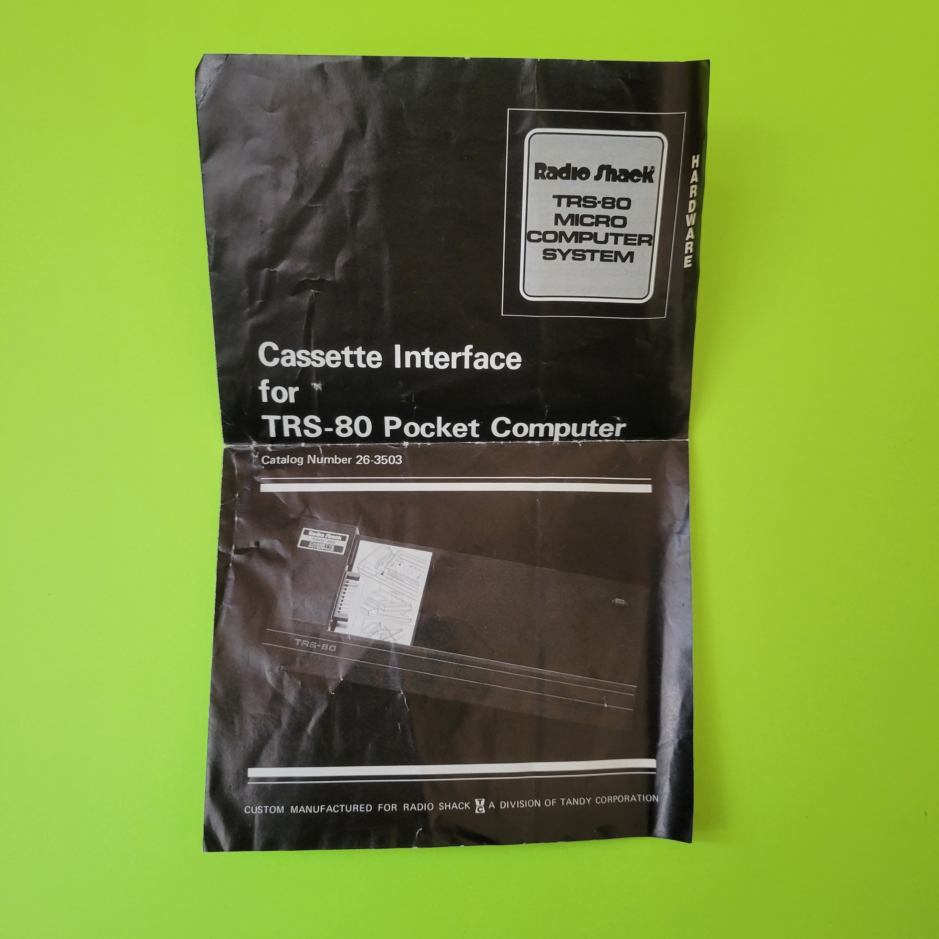 An image of the front of the manuel of a Radio Shack TRS-80 PC-1 cassette interface
